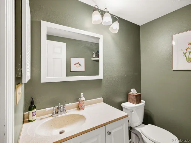 a work room with furniture and a window