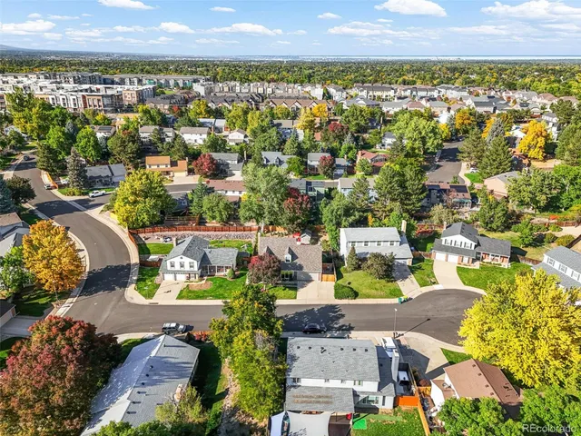 an aerial view of a house with a garden