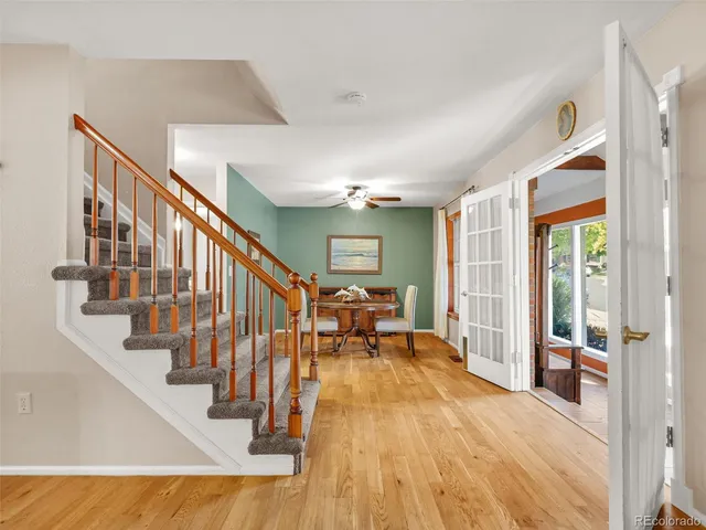a view of living room with furniture and staircase