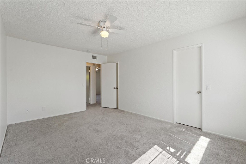 19041 Hamlin Street, Unit 5 Reseda, CA 91335 - Photo 17 of 25 Primary Bedroom view of entry