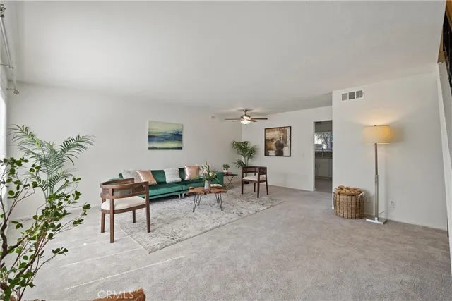 a kitchen with appliances a sink and cabinets