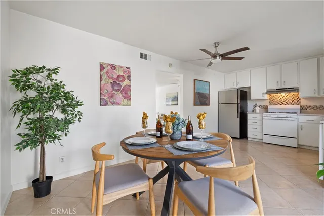 a work room with furniture and a clock