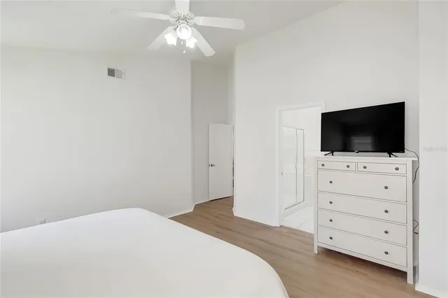 a bathroom with a sink vanity and a mirror
