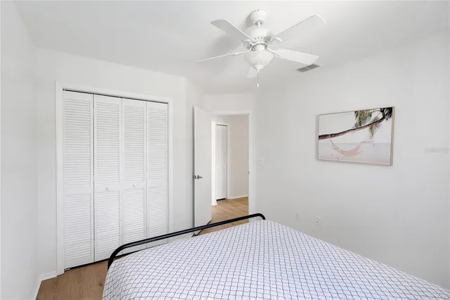 a bedroom with a bunk bed and a dresser