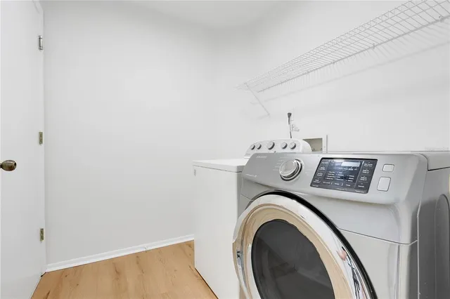 a room with pool table and flat screen tv