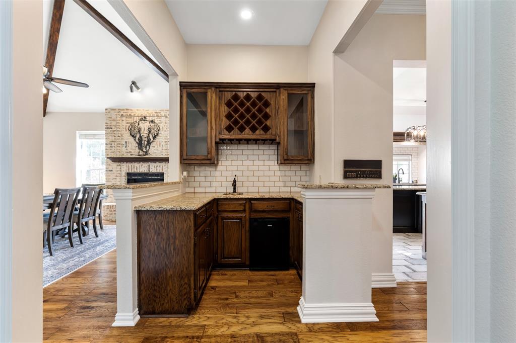 609 Seville Road Denton, TX 76205 - Photo 14 of 40 Wet bar with mini-fridge and lots of storage.