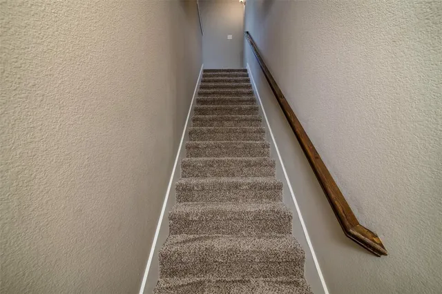 a view of room with window and ceiling fan