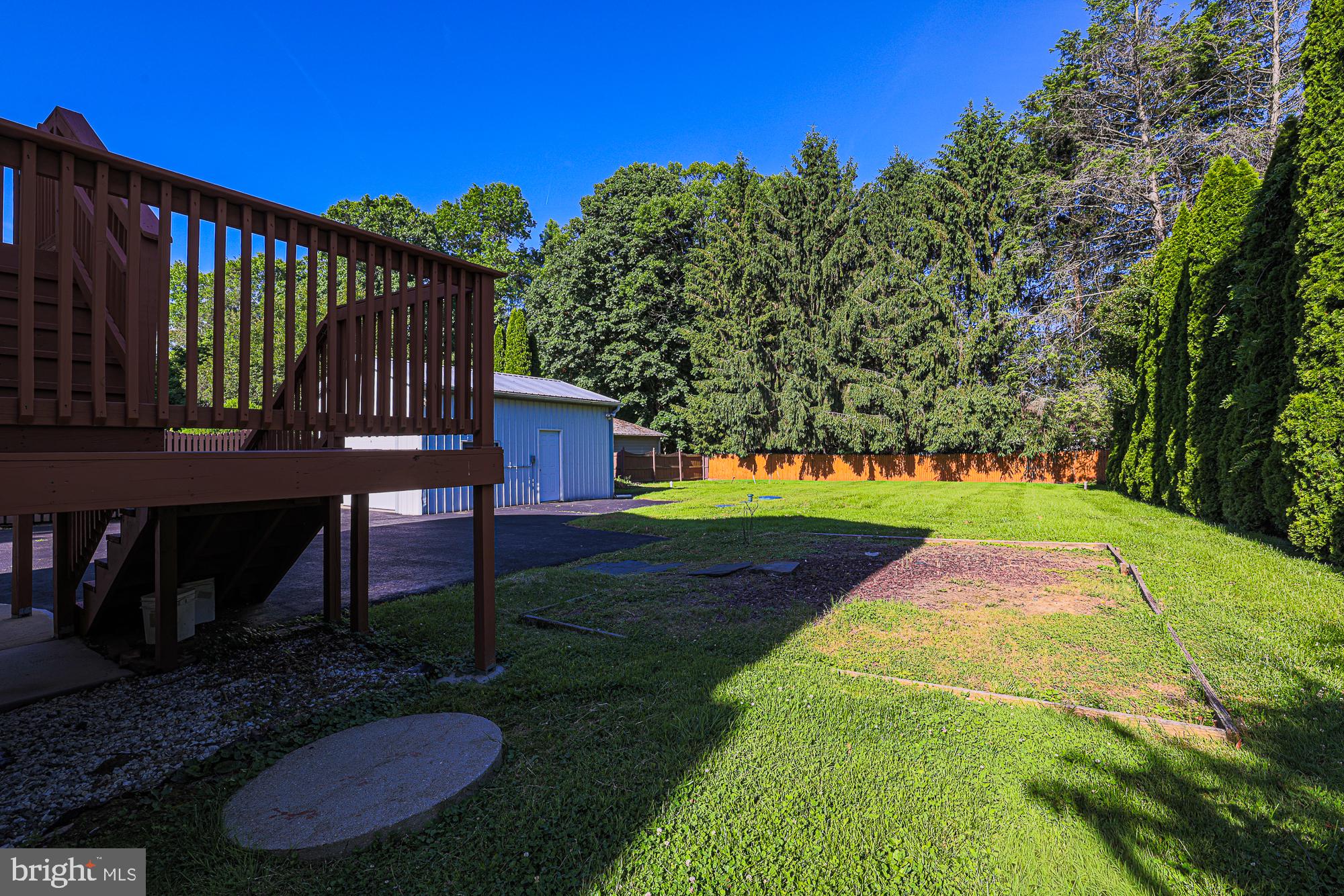 2412 Rocks Road Forest Hill, MD 21050 - Photo 6 of 52 Spacious backyard with lush greenery.