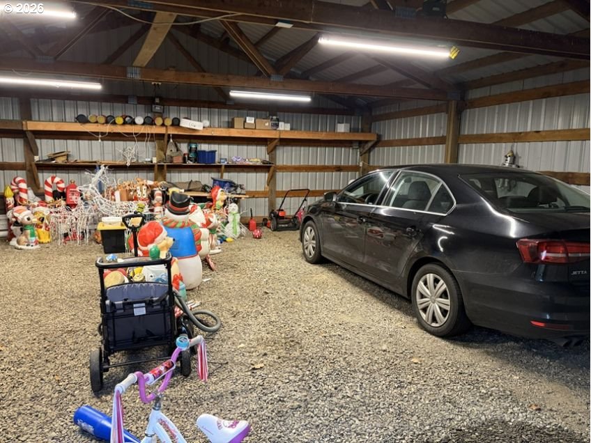 503 Old Pioneer Road Sutherlin, OR 97479 - Photo 22 of 48 a view of parking garage with cars