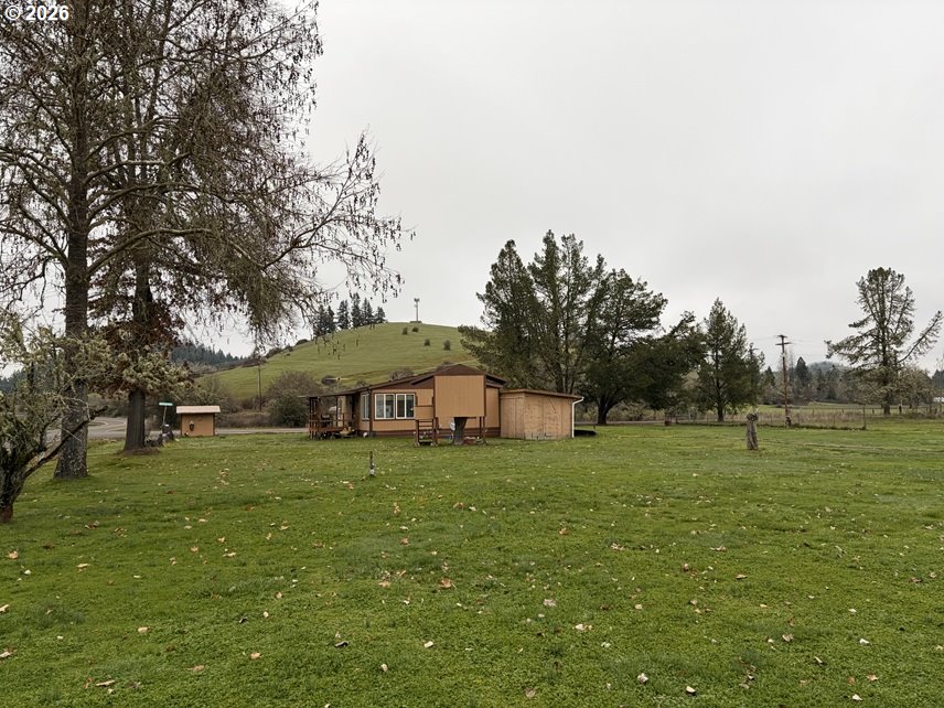 503 Old Pioneer Road Sutherlin, OR 97479 - Photo 25 of 48 a view of a house with a big yard