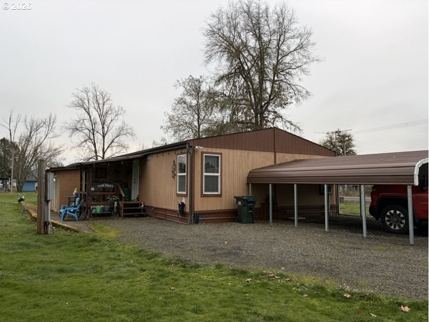 503 Old Pioneer Road Sutherlin, OR 97479 - Photo 26 of 48 a view of a house with a yard and sitting area