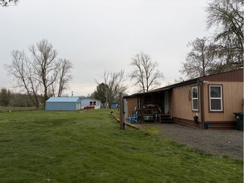 503 Old Pioneer Road Sutherlin, OR 97479 - Photo 31 of 48 a view of a backyard with plants and a garden