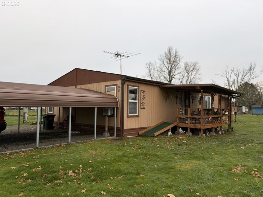 503 Old Pioneer Road Sutherlin, OR 97479 - Photo 34 of 48 a backyard of a house with table and chairs