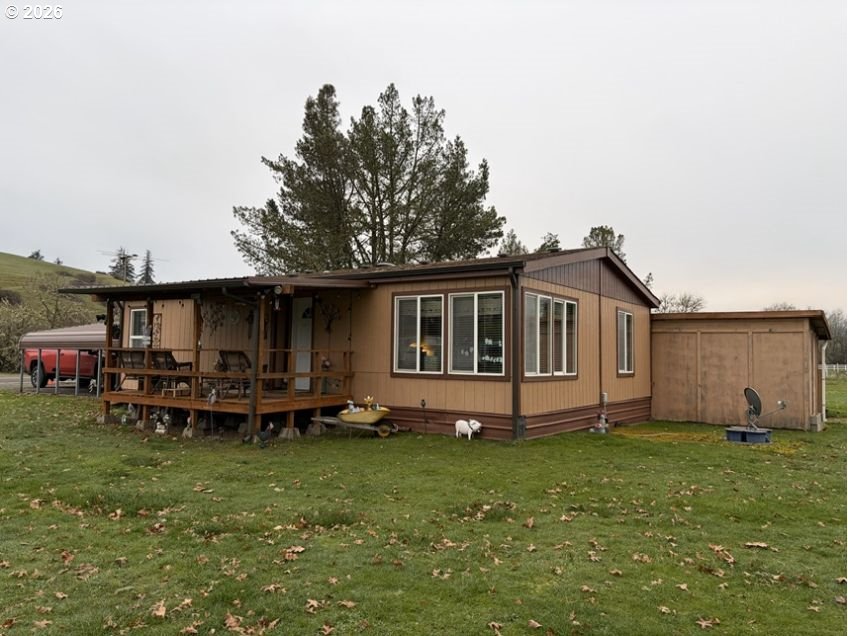 503 Old Pioneer Road Sutherlin, OR 97479 - Photo 35 of 48 a front view of house with yard and seating area