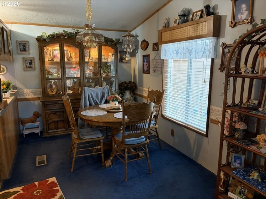 503 Old Pioneer Road Sutherlin, OR 97479 - Photo 39 of 48 a view of a dining room with furniture and a window