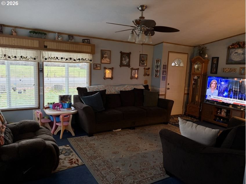 503 Old Pioneer Road Sutherlin, OR 97479 - Photo 40 of 48 a living room with furniture and a flat screen tv