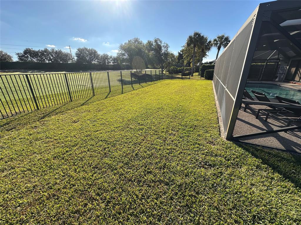11392 Boca Woods Lane Boca Raton, FL 33428 - Photo 10 of 26 a view of a garden