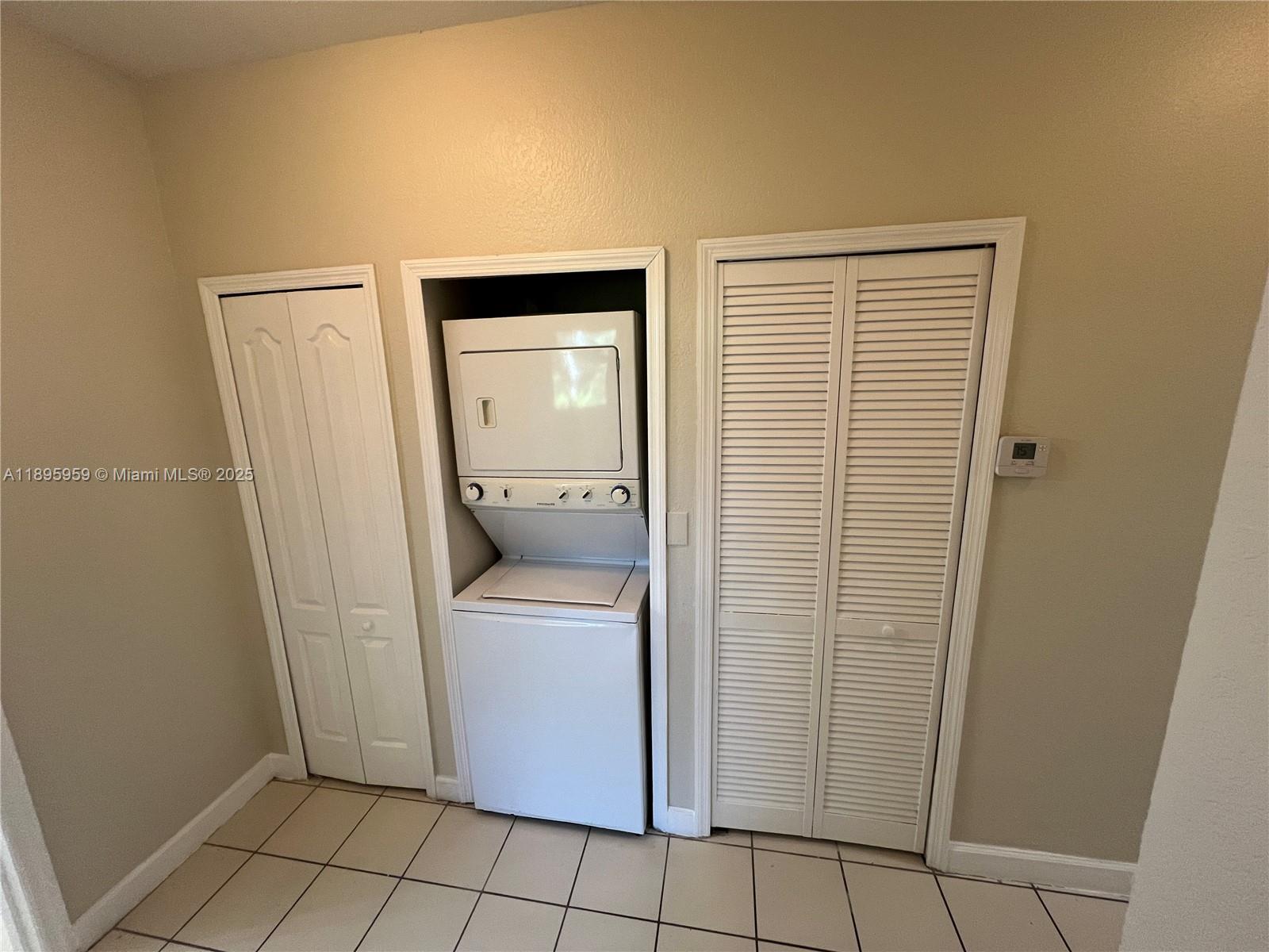 2903 Southeast 17th Avenue, Unit 201 Homestead, FL 33035 - Photo 15 of 42 a utility room with dryer and washer