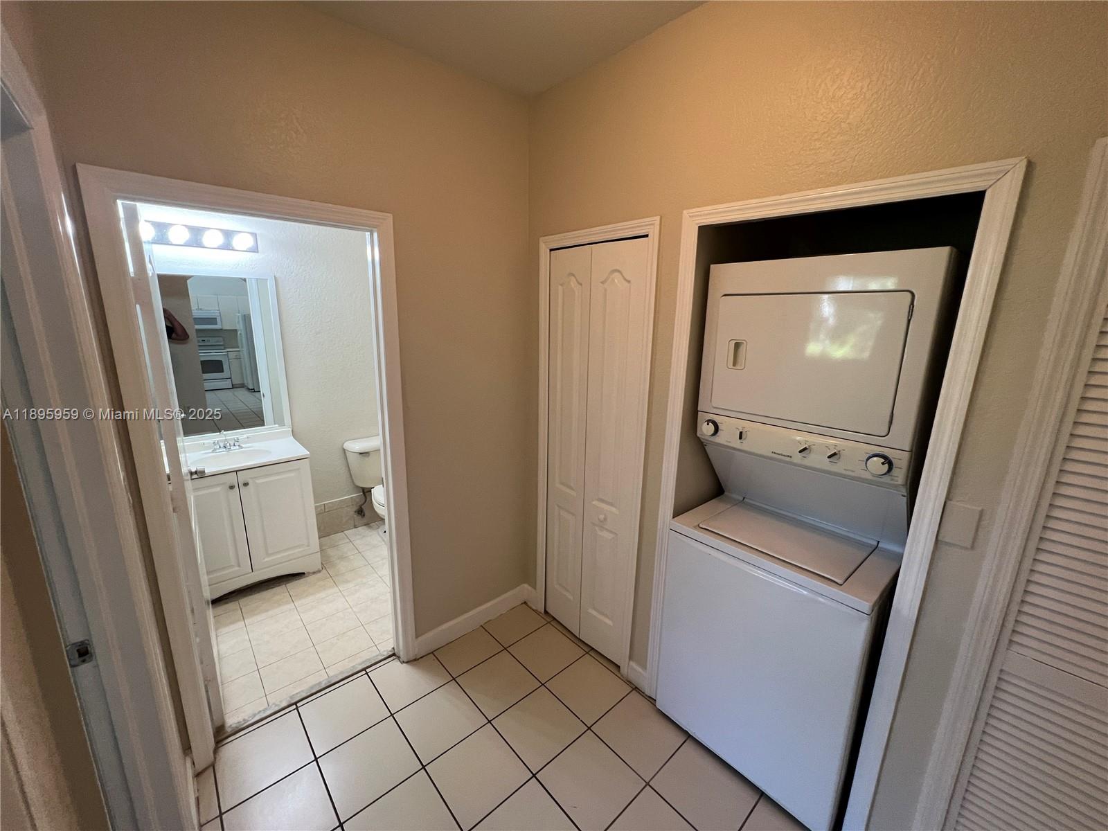 2903 Southeast 17th Avenue, Unit 201 Homestead, FL 33035 - Photo 16 of 42 a room with a washer and dryer