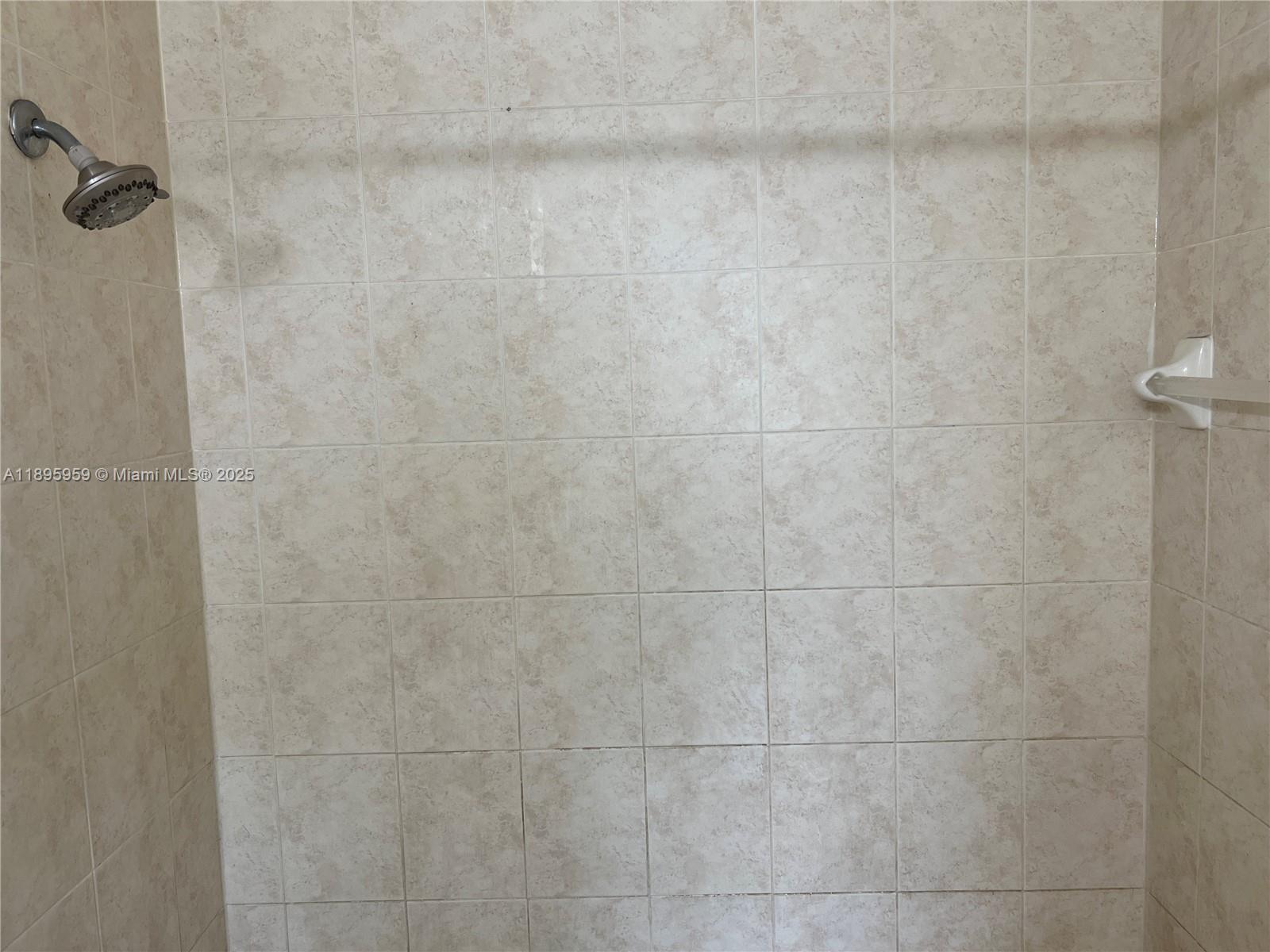 2903 Southeast 17th Avenue, Unit 201 Homestead, FL 33035 - Photo 33 of 42 a bathroom with a shower