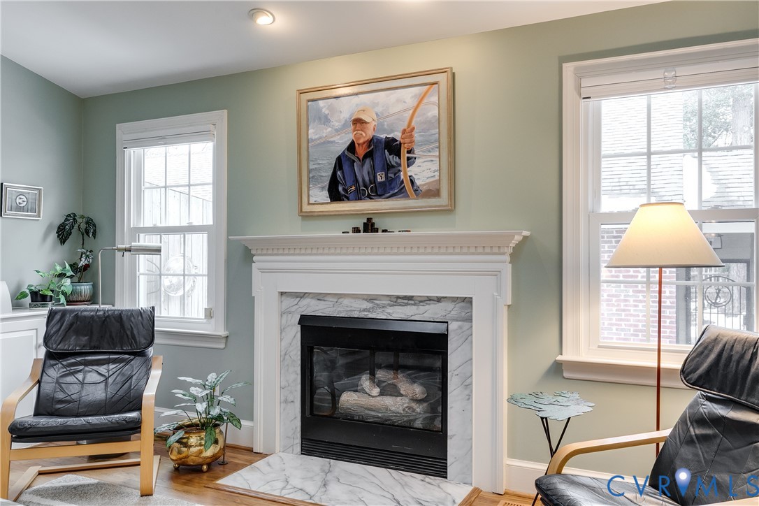 498 St Albans Way Henrico, VA 23229 - Photo 20 of 46 a living room with furniture and a fireplace