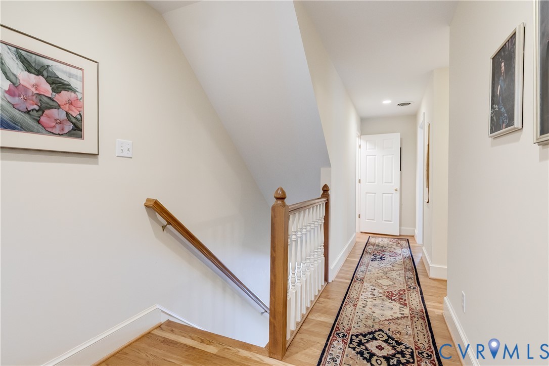 498 St Albans Way Henrico, VA 23229 - Photo 24 of 46 a view of a hallway with paintings on the wall