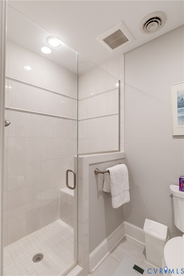 498 St Albans Way Henrico, VA 23229 - Photo 28 of 46 a bathroom with a shower a toilet and a sink