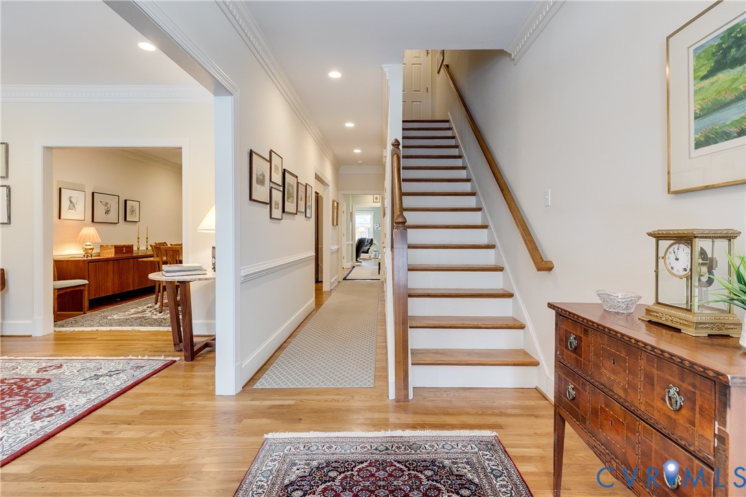 498 St Albans Way Henrico, VA 23229 - Photo 3 of 46 a view of a hallway with wooden floor and staircase