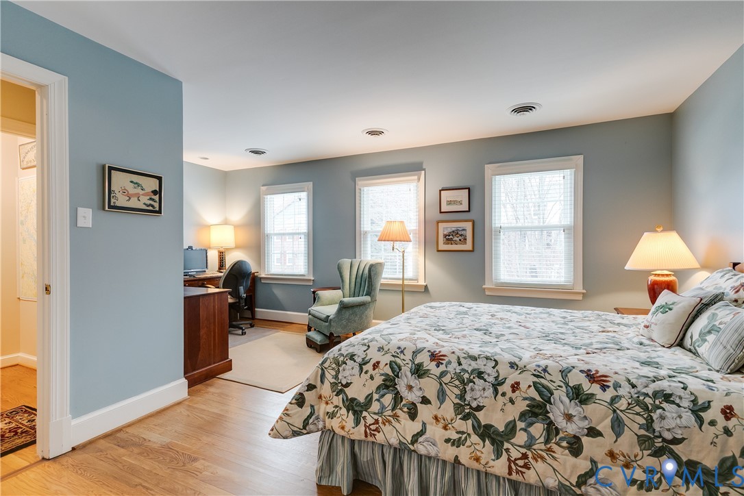 498 St Albans Way Henrico, VA 23229 - Photo 31 of 46 a bedroom with a bed and wooden floor