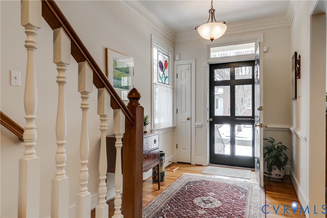 498 St Albans Way Henrico, VA 23229 - Photo 4 of 46 a view of an entryway with wooden floor and livingroom view
