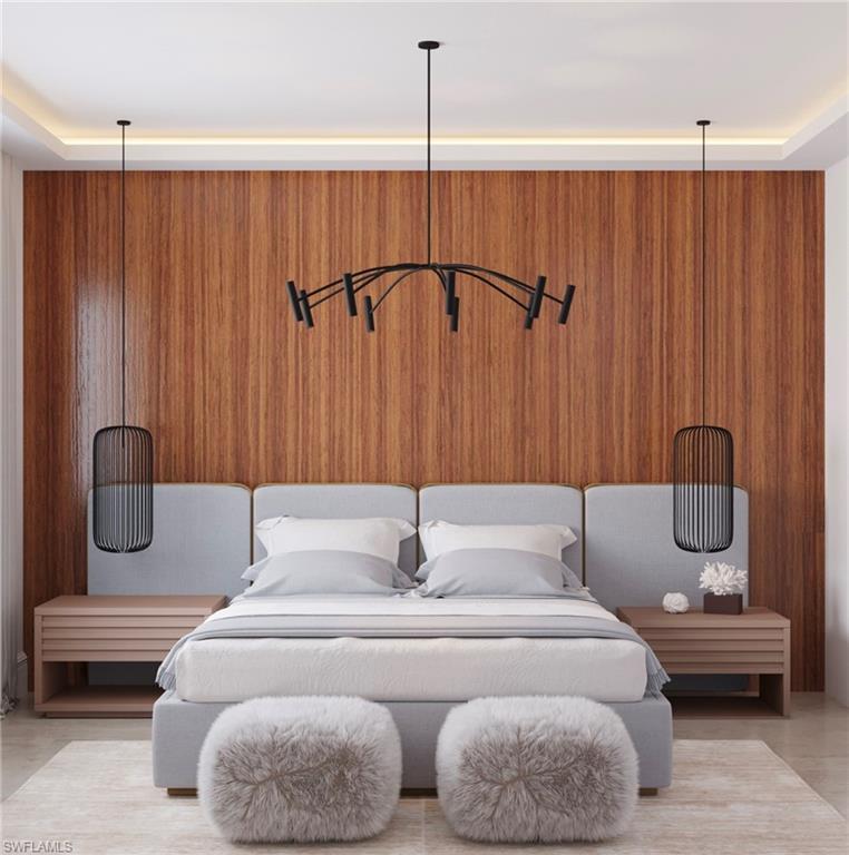 180 9th Street South, Unit 202 Naples, FL 34102 - Photo 2 of 5 a bathroom with a tub and shower