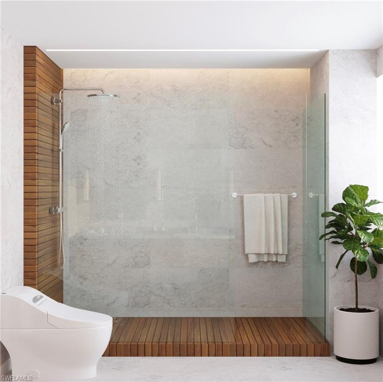 180 9th Street South, Unit 202 Naples, FL 34102 - Photo 3 of 5 a view of bathroom with shower and plant