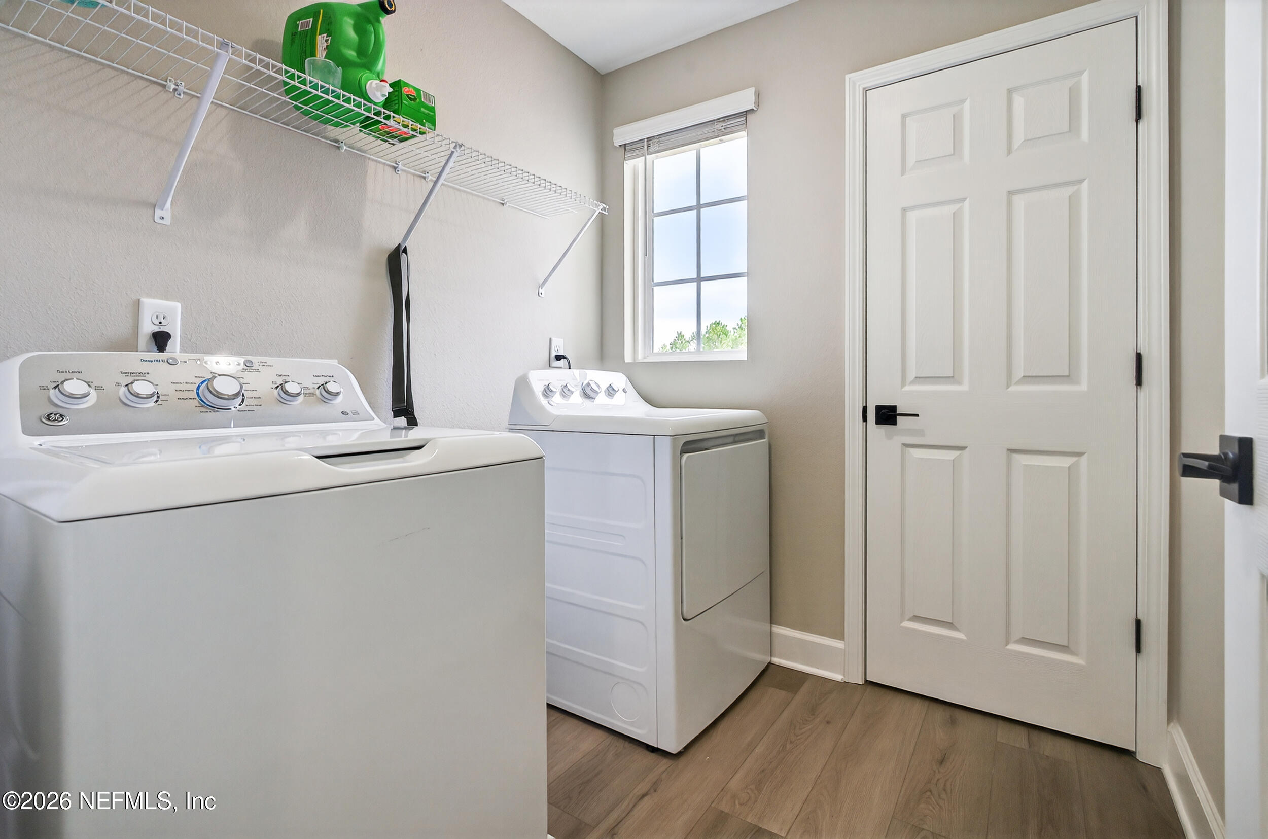 57 Cedar Elm Way St. Augustine, FL 32092 - Photo 35 of 62 a utility room with dryer and washer