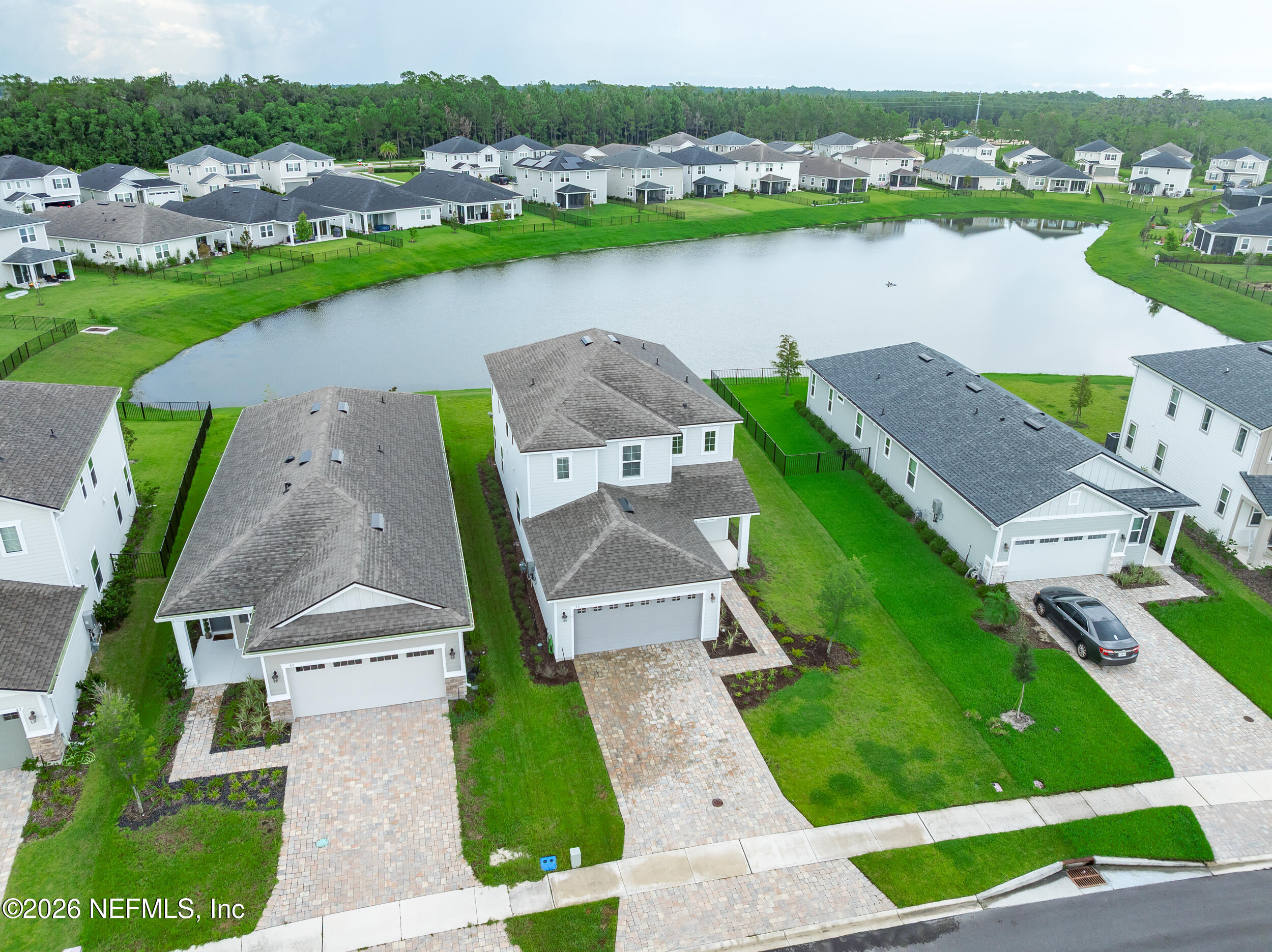 57 Cedar Elm Way St. Augustine, FL 32092 - Photo 42 of 62 an aerial view of a house with outdoor space and lake view