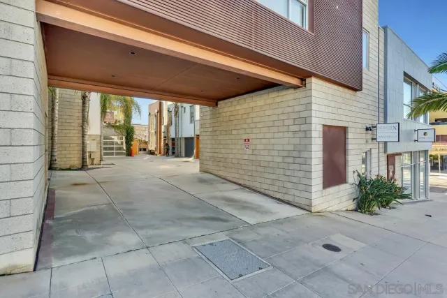 a front view of a building with street view