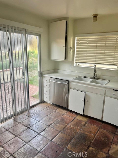 5110 Caldera Court Riverside, CA 92507 - Photo 11 of 28 a kitchen with a sink cabinets and window