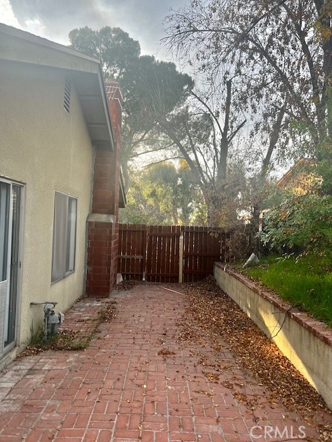 5110 Caldera Court Riverside, CA 92507 - Photo 22 of 28 a view of a house with a yard