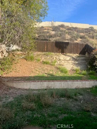 a view of a lake from a yard