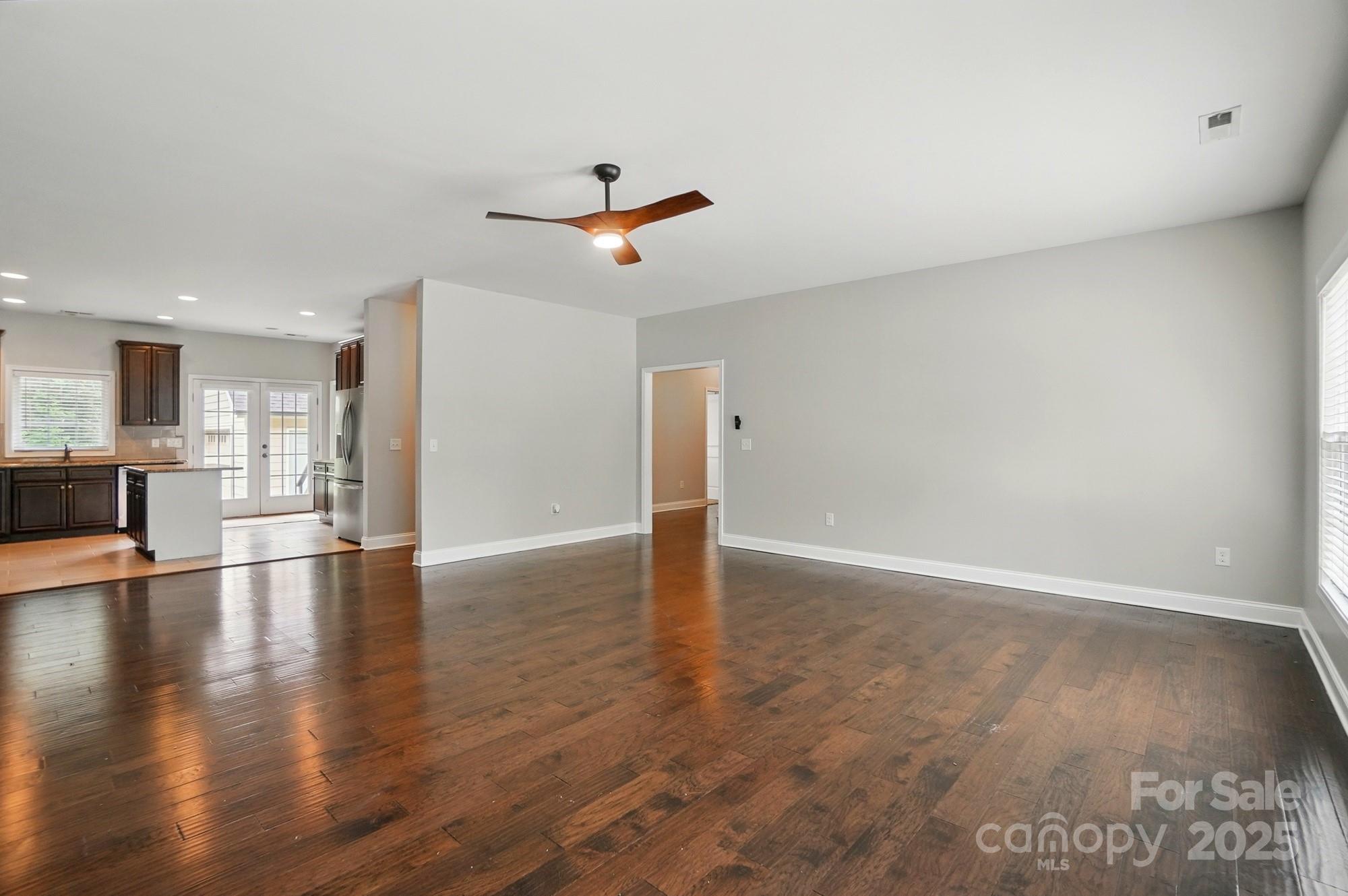 6618 Alexander Road Charlotte, NC 28270 - Photo 7 of 34 a view of a kitchen with a dishwasher and wooden floor