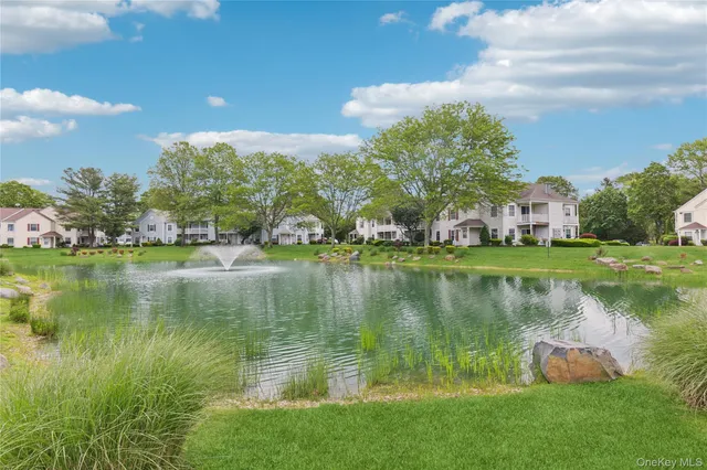 a view of a lake with a building in the background