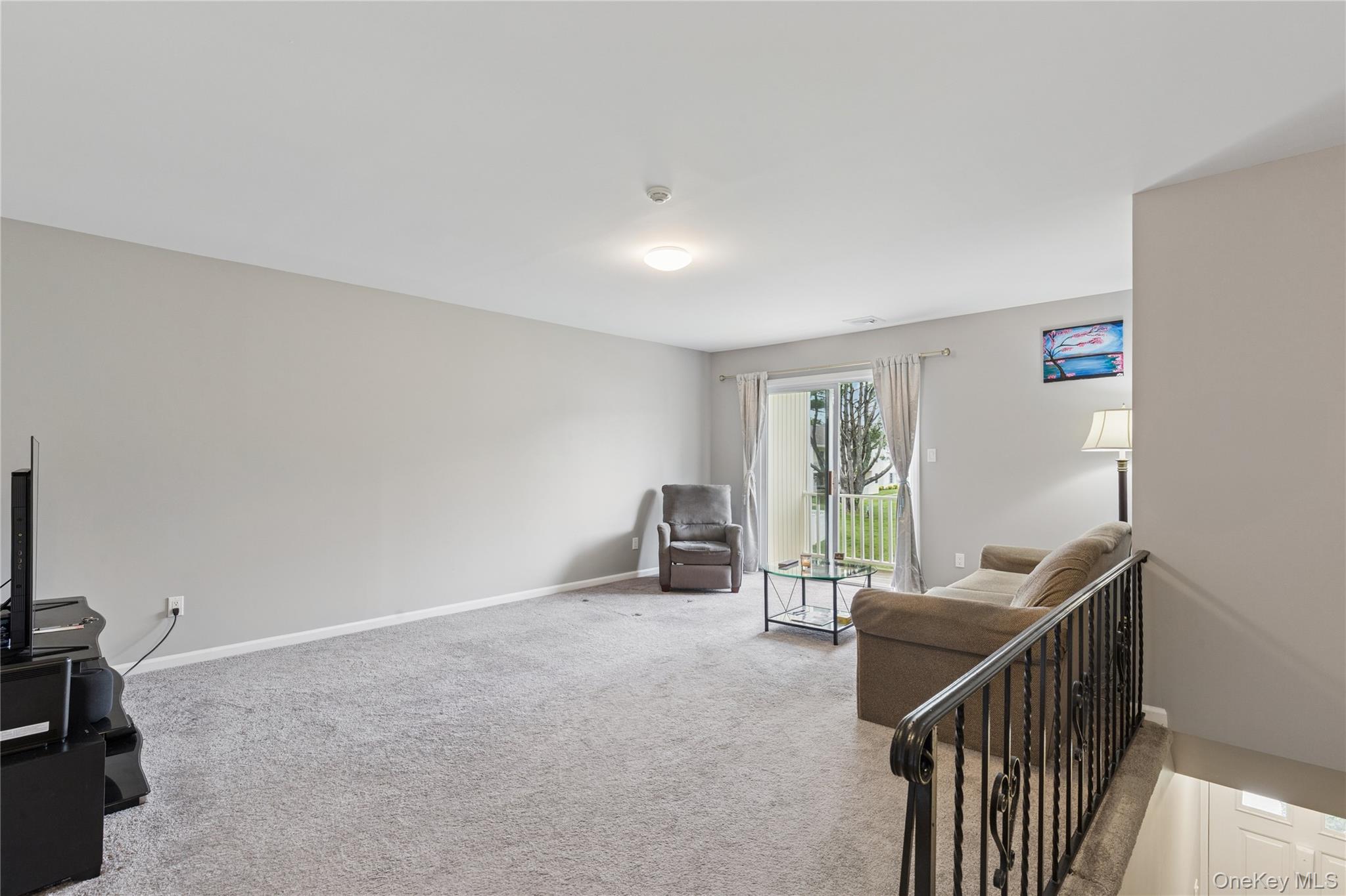 241 Fairview Circle Middle Island, NY 11953 - Photo 6 of 24 a view of a livingroom with furniture and windows