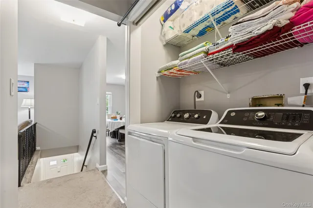 a utility room with dryer and washer