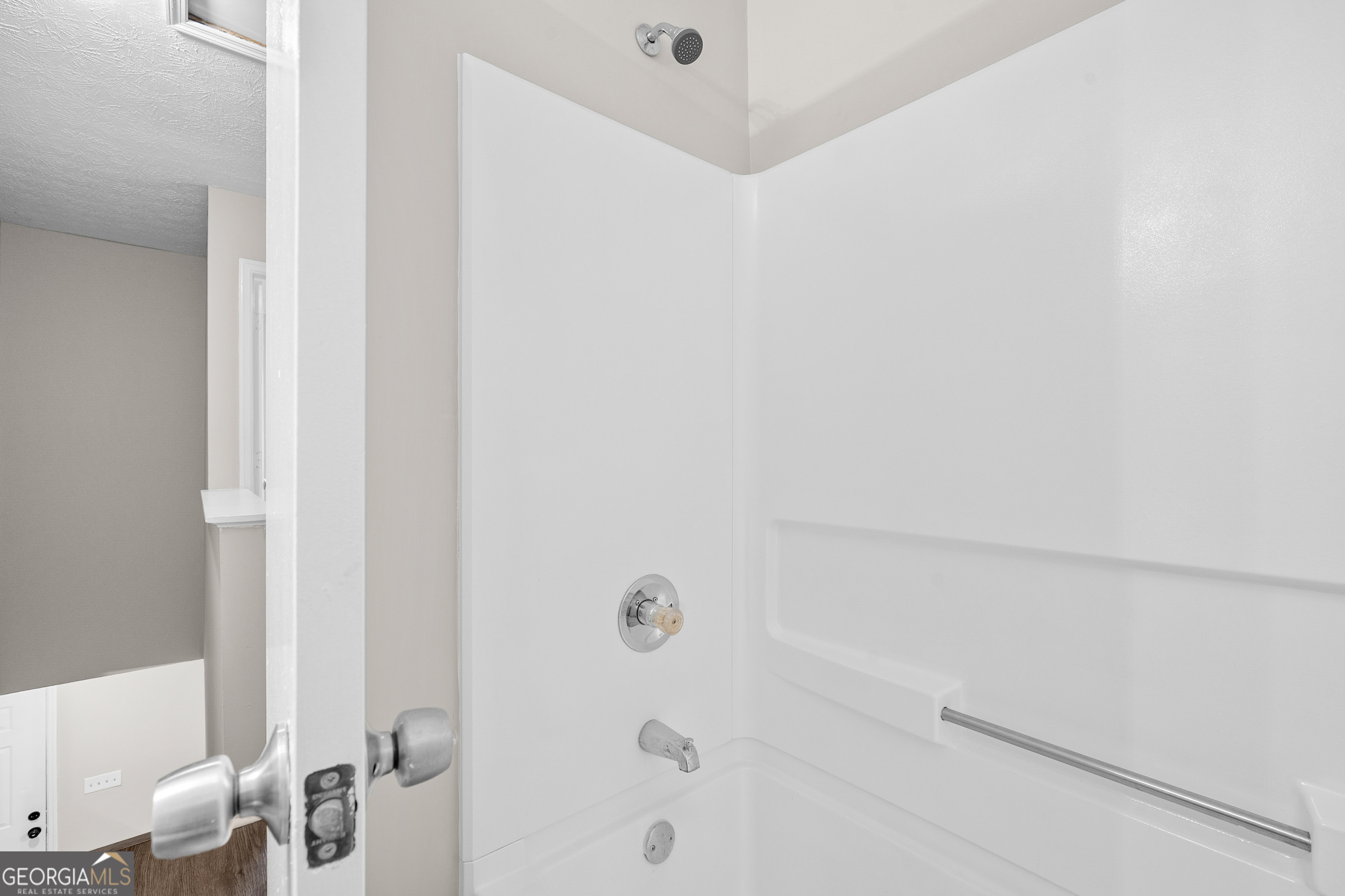 6706 Bent Creek Drive Rex, GA 30273 - Photo 16 of 27 a bathroom with a shower