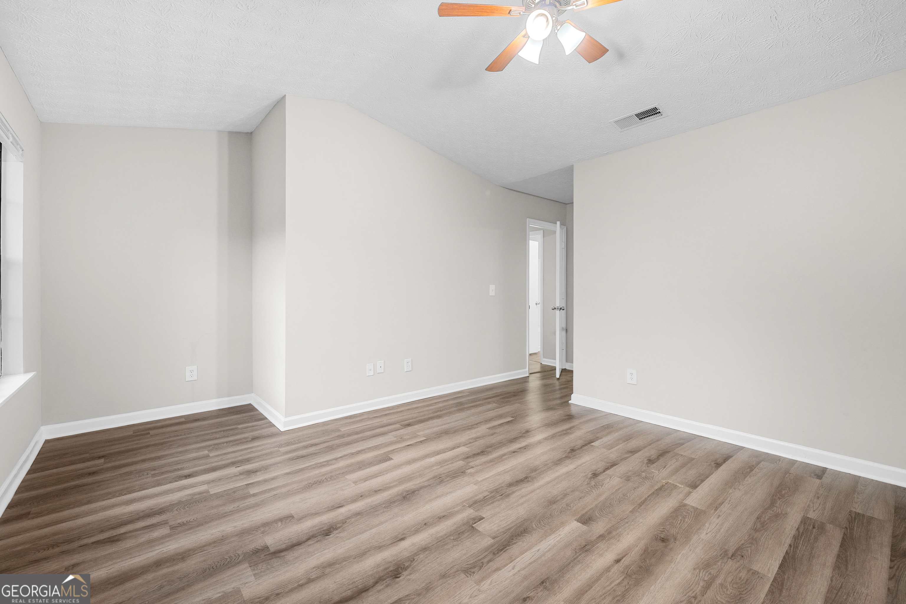 6706 Bent Creek Drive Rex, GA 30273 - Photo 7 of 27 wooden floor in an empty room