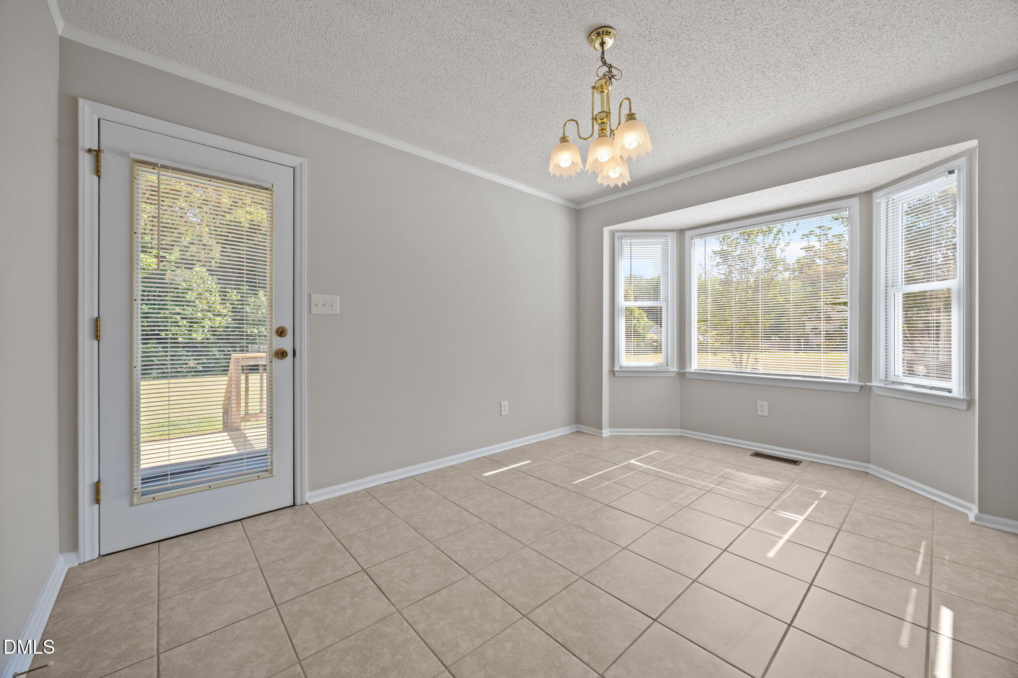 40 Circle Tree Lane Angier, NC 27501 - Photo 12 of 39 a view of an empty room with a window