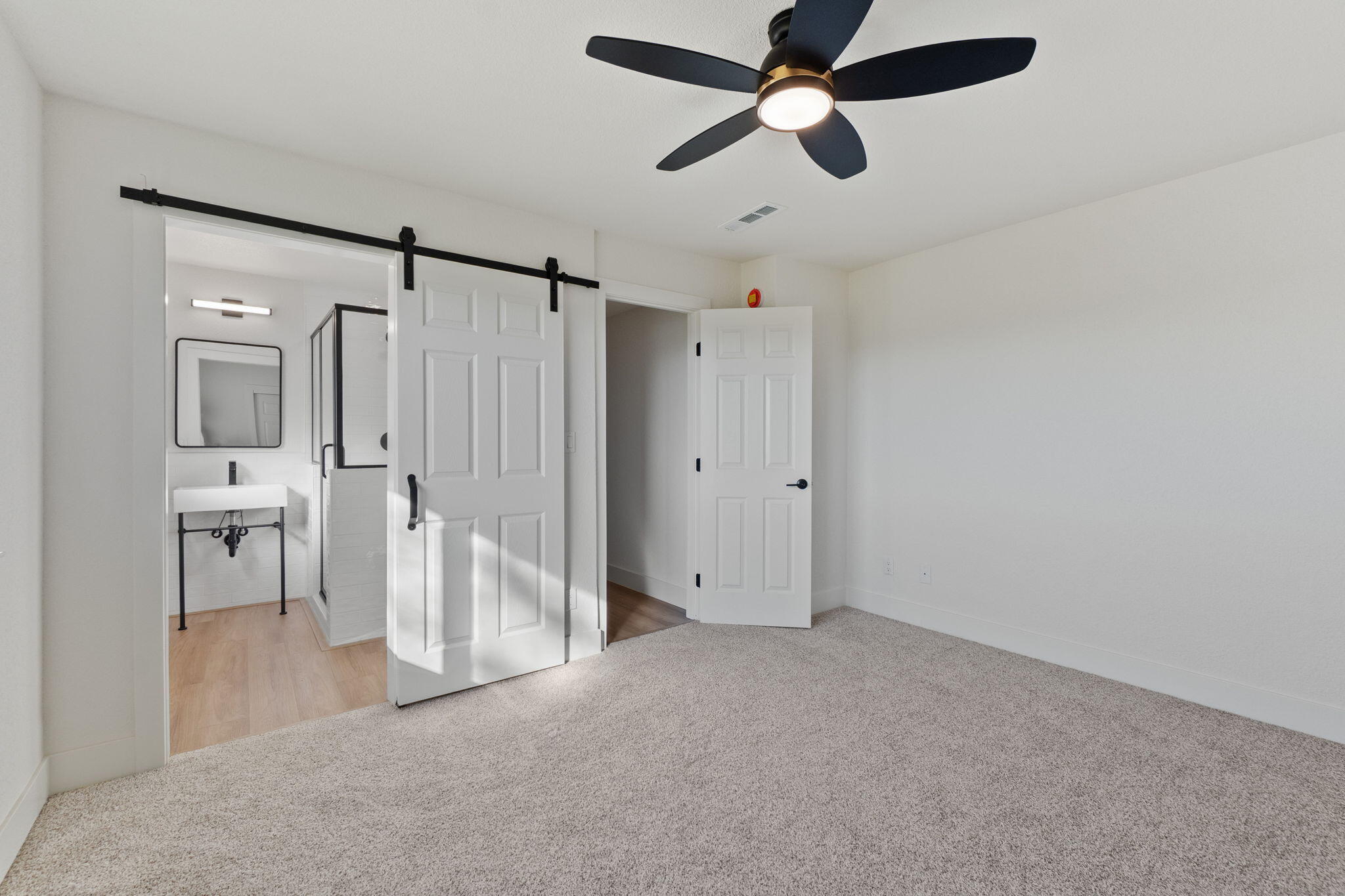 22809 Venzke Road Cottonwood, CA 96022 - Photo 13 of 25 Master w barn door to bathroom