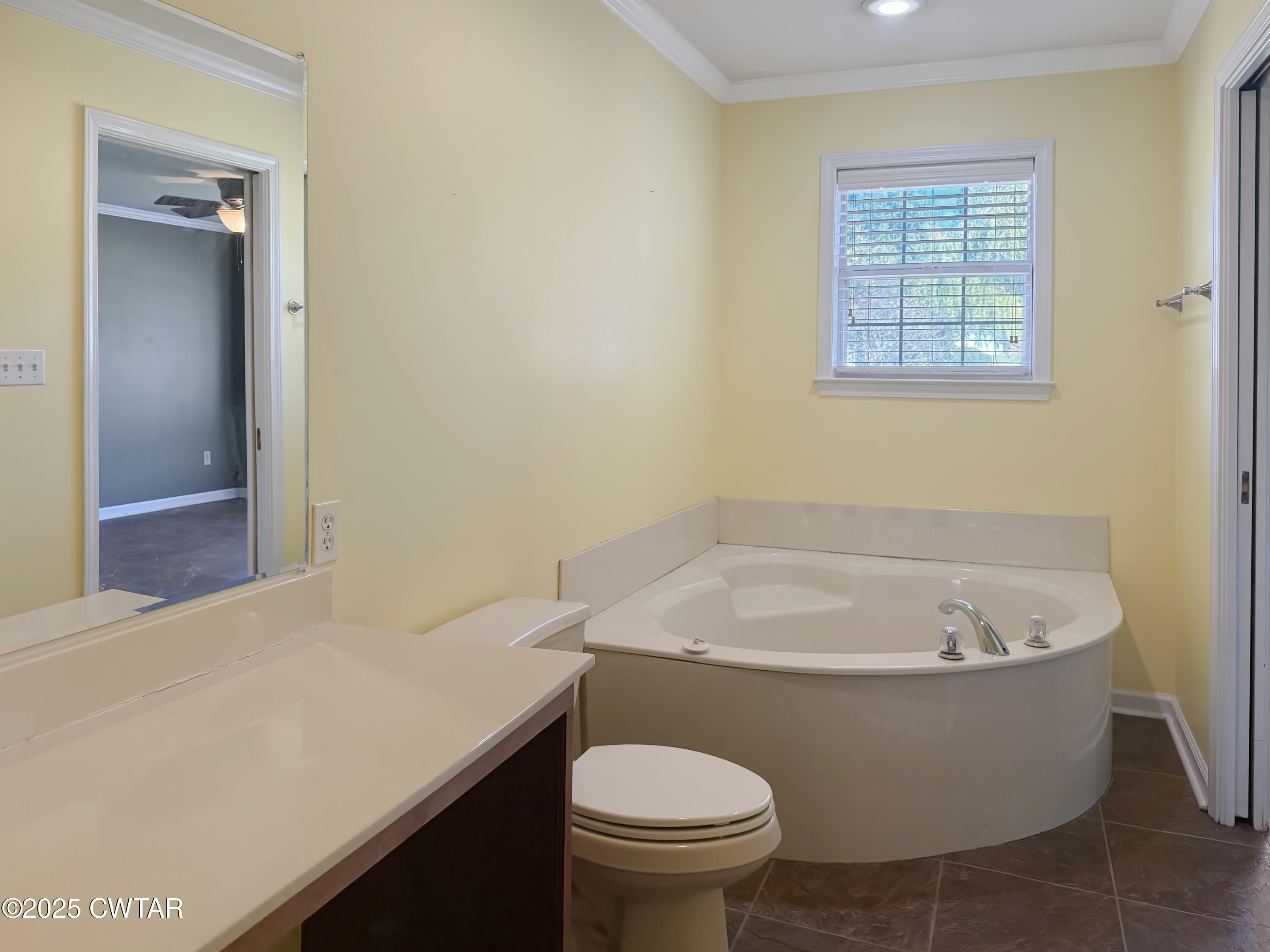 45 Village Avenue Ripley, TN 38063 - Photo 7 of 11 a bathroom with a sink and a toilet