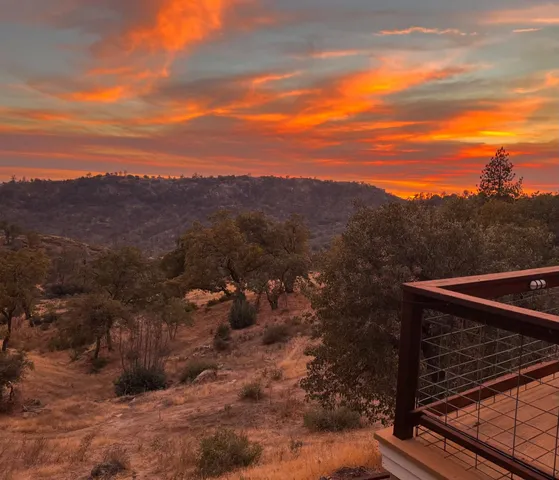 a blue swimming pool with a yard