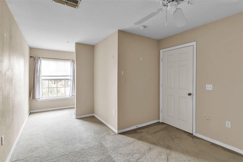 5511 Rosehill Road, Unit 203 Sarasota, FL 34233 - Photo 25 of 49 a view of an empty room with a window