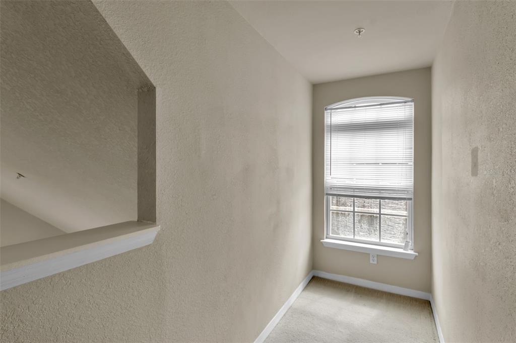 5511 Rosehill Road, Unit 203 Sarasota, FL 34233 - Photo 36 of 49 a view of an empty room with a window